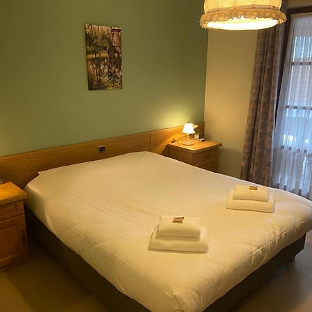 Hotel Monika Zutendaal Bagian luar foto